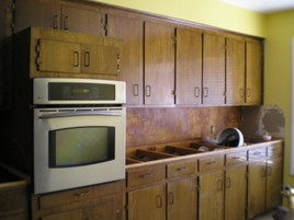 Kitchen Remodeling During. Removed old countertops and cook top. Removed lightening fixtures. Kitchen Renovation.