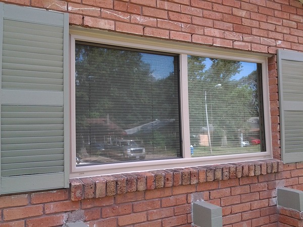 Replacement Window. Almond Color Slider. After of Before and After. Replacement Insulated Window.