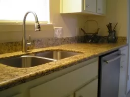 Kitchen Remodeling New Sink and Silver Pull Out Sprayer Faucet with Granite Countertops and New Dishwasher