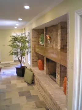 Living Room Recessed Lights, New Paint, New Trim Work, New Slate Flooring and New Fireplace Mantel.