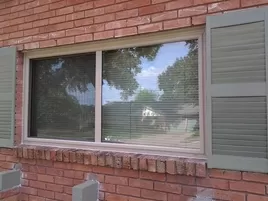 Replacement Window Almond Color Slider. Replacement Insulated Windows.