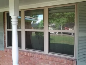 Home Remodeling Triple Single Windows in Almond