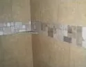 Shower mosaic corner tile with shelf